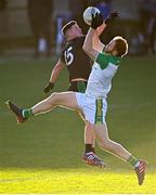 27 November 2022; Conor Glass of Glen Watty Graham's in action against Tomas McCann of Erin's Own Cargin during the AIB Ulster GAA Football Senior Club Championship Semi Final match between Erin's Own Cargin and Glen Watty Graham's at O'Neill's Healy Park in Omagh. Photo by Ramsey Cardy/Sportsfile