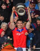 27 November 2022; Conor Cooney, captain of St. Thomas lifts the cup after winning the Galway County Senior Hurling Championship Final Replay match between St Thomas and Loughrea at Pearse Stadium in Galway. Photo by Ray Ryan/Sportsfile