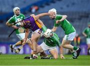 27 November 2022; Darragh Butler of Kilmacud Crokes is tackled by Marty Kavanagh of St Mullin’s during the AIB Leinster GAA Hurling Senior Club Championship Semi-Final match between Naomh Moling and Kilmacud Crokes at Croke Park in Dublin. Photo by Daire Brennan/Sportsfile