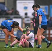 27 November 2022; Shannon Richardson of O'Dwyer's is consoled by Sarah Donnellan, left, and Laura Kelly of Salthill Knocknacarra after the CurrentAccount.ie LGFA All-Ireland Junior Club Championship Semi-Final match between Salthill Knocknacarra, Galway, and O’Dwyer's, Dublin, at The Prairie in Salthill, Galway. Photo by Piaras Ó Mídheach/Sportsfile