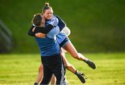 27 November 2022; Grace Shannon of Longford Slashers celebratres with Longford Slashers manager Conor Clarke after the CurrentAccount.ie LGFA All-Ireland Intermediate Club Championship Semi-Final match between Longford Slashers and Charlestown, Mayo, at Michael Fay Park in Farneyhoogan, Longford. Photo by Harry Murphy/Sportsfile