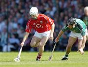 30 May 2004; Timmy McCarthy, Cork, is tackled by TJ Ryan, Limerick. Guinness Munster Senior Hurling Championship Semi-Final, Limerick v Cork, Gaelic Grounds, Limerick. Picture credit; Ray McManus / SPORTSFILE