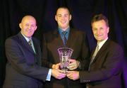 29 May 2004; Michael Quirke, is presented with the Senior Male Player of the Year award by Tony Colgan, left, President of Basketball Ireland and Pat Duffy, Chairman, National Coaching and Training Centre, at the Basketball Ireland annual awards at the Burlington Hotel, Dublin. Picture credit; Brendan Moran / SPORTSFILE