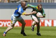 23 May 2004; Donal Curtis, Meath, in action against Adrian Foley, Wicklow. Bank of Ireland Leinster Senior Football Championship, Meath v Wicklow, Croke Park, Dublin. Picture credit; Brian Lawless / SPORTSFILE