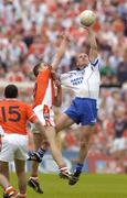 23 May 2004; Dick Clerkin, Monaghan, in action against Paul McGrane, Armagh. Bank of Ireland Ulster Senior Football Championship, Monaghan v Armagh, St. Tighernach's Park, Clones, Co. Monaghan. Picture credit; Pat Murphy / SPORTSFILE