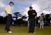 1 June 2004; World leading golf coach Butch Harmon points the way to Michael McGrane, Headfort Golf Club, Co. Meath, at the Red Bull masterclass. Portmarnock Golf Club, Portmarnock, Co. Dublin. Picture credit; David Maher / SPORTSFILE