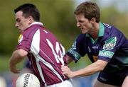 30 May 2004; Padraic Joyce, Galway, is tackled by Damien McKenna, London. Bank of Ireland Connacht Senior Football Championship, London v Galway, Emerald Gaelic Grounds, Ruislip, London. Picture credit; Brian Lawless / SPORTSFILE