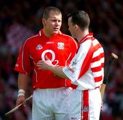 30 May 2004; Cork team-mates Diarmuid O'Sullivan and goalkeeper Donal Og Cusack in conversation during the game. Guinness Munster Senior Hurling Championship Semi-Final, Limerick v Cork, Gaelic Grounds, Limerick. Picture credit; Ray McManus / SPORTSFILE