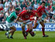 30 May 2004; Ronan Curran, Cork, is tackled by Donnacha Sheehan, Limerick. Guinness Munster Senior Hurling Championship Semi-Final, Limerick v Cork, Gaelic Grounds, Limerick. Picture credit; Ray McManus / SPORTSFILE