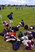 30 May 2004; Members of the girls Galway Primary Schools team have some lunch after their game. Primary Schools Game, London v Galway, Emerald Gaelic Grounds, Ruislip, London. Picture credit; Brian Lawless / SPORTSFILE