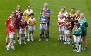3 June 2004; Mary O'Connor and Roisin Ni Maolalai, Cork, Ailbhe Kelly and Aaron Moore, Galway, Edel Mason and Tam Thag -Lien, Antrim, Joanne Ryan and Almath Egan Tipperay, Claire Doherty and Gemma Byrne, Derry, Kate Kelly and Kha Nhu--Lien, Wexford, Maire O'Connor and Vanessa Keogh, Kilkenny and Rose Collins and Paul Tosin Fabelurin, Limerick, at the launch of the Foras na Gaeilge Senior All Ireland Camogie Championship, Croke Park, Dublin. Picture credit; Damien Eagers / SPORTSFILE
