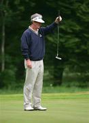 4 June 2004; Defending champion Noel Ratcliffe, Australia, lines up a putt during the first round of the AIB Irish Seniors Open. Adare Manor Hotel Golf and Country Club, Adare, Co. Limerick. Picture credit; Kieran Clancy / SPORTSFILE