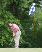 4 June 2004; Denis O'Sullivan, Ireland, watches his putt  during the first round of the AIB Irish Seniors Open. Adare Manor Hotel Golf and Country Club, Adare, Co. Limerick. Picture credit; Kieran Clancy / SPORTSFILE