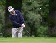 4 June 2004; Defending champion Noel Ratcliffe, Australia,  pitches onto a green during the first round of the AIB Irish Seniors Open. Adare Manor Hotel Golf and Country Club, Adare, Co. Limerick. Picture credit; Kieran Clancy / SPORTSFILE