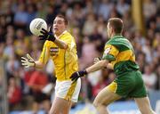 30 May 2004; Darren O'Hare, Antrim, in action against Raymond Sweeney, Donegal. Bank of Ireland Ulster Senior Football Championship, Donegal v Antrim, McCool Park, Ballybofey, Co. Donegal. Picture credit; Damien Eagers / SPORTSFILE