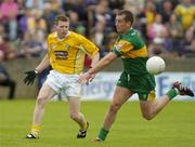 30 May 2004; Kevin Brady, Antrim, in action against Barry Monaghan, Donegal. Bank of Ireland Ulster Senior Football Championship, Donegal v Antrim, McCool Park, Ballybofey, Co. Donegal. Picture credit; Damien Eagers / SPORTSFILE