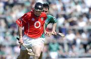 30 May 2004; Ben O'Connor, Cork, in action against Peter Lawlor, Limerick. Guinness Munster Senior Hurling Championship Semi-Final, Limerick v Cork, Gaelic Grounds, Limerick. Picture credit; Ray McManus / SPORTSFILE