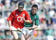 30 May 2004; Ben O'Connor, Cork, is tackled by Peter Lawlor, Limerick. Guinness Munster Senior Hurling Championship Semi-Final, Limerick v Cork, Gaelic Grounds, Limerick. Picture credit; Ray McManus / SPORTSFILE