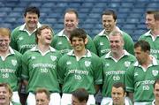 3 June 2004; Ireland second row Donnacha O'Callaghan, centre, gives his team-mates something to laugh about by wearing some false ears and teeth during the Irish rugby squad photo before their departure to South Africa. Included in the photo are, back row, from left, Reggie Corrigan, Frank Sheahan, Marcus Horan and Tyrone Howe, centre, from left, Paul O'Connell, Malcolm O'Kelly, Donnacha O'Callaghan, Victor Costello, and Guy Easterby and front, Brian O'Driscoll, Eddie O'Sullivan, Ronan O'Gara, Kevin Maggs and Girvan Dempsey. Picture credit; Brendan Moran / SPORTSFILE