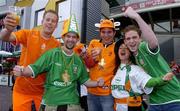 5 June 2004; Republic of Ireland supporters Kathleen O'Toole with her Dutch sons Sebastian and Tristan Quist, in Irish shirts, cheer on their team with Dutch supporters Andre Koole and Marco van der Weyden before the game. International Friendly, Holland v Republic of Ireland, Amsterdam Arena, Amsterdam, Holland. Picture credit; David Maher / SPORTSFILE