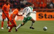 5 June 2004; Alan Quinn, Republic of Ireland, in action against Wesley Sneijder, Holland. International Friendly, Holland v Republic of Ireland, Amsterdam Arena, Amsterdam, Holland. Picture credit; David Maher / SPORTSFILE
