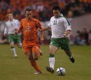 5 June 2004; Republic of Ireland's Andy Reid in action against Holland's Wesley Sneijder. International Friendly, Holland v Republic of Ireland, Amsterdam Arena, Amsterdam, Holland. Picture credit; Pat Murphy / SPORTSFILE