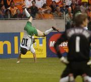 5 June 2004; Republic of Ireland's Robbie Keane celebrates after scoring his sides first goal as Dutch goalkeeper Edwin Van Der Sar looks on. International Friendly, Holland v Republic of Ireland, Amsterdam Arena, Amsterdam, Holland. Picture credit; Pat Murphy / SPORTSFILE