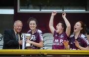 14 August 2013; Pat Quill, President of the Ladies Gaelic Football Association, presents the cup to Galway captain Megan Heneghan. All-Ireland Ladies Minor A Championship Final Replay, Dublin v Galway, Cusack Park, Mullingar, Co. Westmeath. Picture credit: Brian Lawless / SPORTSFILE