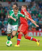 14 August 2013; Niall McGinn, Northern Ireland, in action against Viktor Faitzulin, Russia. 2014 FIFA World Cup Qualifier Group F Refixture, Northern Ireland v Russia, Windsor Park, Belfast, Co. Antrim. Picture credit: Liam McBurney / SPORTSFILE