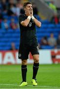 14 August 2013; Shane Long, Republic of Ireland, reacts after his shot went wide during the first half. International Friendly, Wales v Republic of Ireland, Cardiff City Stadium, Cardiff, Wales. Picture credit: David Maher / SPORTSFILE
