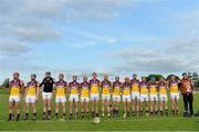 26 June 2013; The Wexford team stand for the national anthem. Bord Gáis Energy Leinster GAA Hurling Under 21 Championship Semi-Final, Wexford v Carlow, Dr. Cullen Park, Carlow. Picture credit: Brian Lawless / SPORTSFILE
