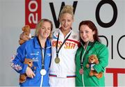 15 August 2013; Ireland's Ellen Keane, from Clontarf, Dublin, right, with her bronze medal after finishing third in the final of the Women's 100m Breaststroke SB8 in a time of 1:23.74, with winner Olesya Vladykina, Russia, centre, and second place Claire Cashmore, Great Britain. 2013 IPC Swimming World Championships, Aquatic Complex, Parc Jean-Drapeau, Montreal, Canada. Picture credit: Vaughn Ridley / SPORTSFILE
