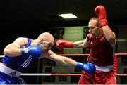 16 August 2013; Stephen Ward, Monkstown Boxing Club, left, exchanges punches with Jimmy Sweeney, Drimnagh Boxing Club, during their 91kg bout. IABA Elite Boxing Competition, National Stadium, Dublin. Photo by Sportsfile