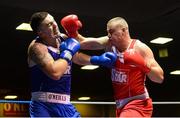 16 August 2013; Dean Gardiner, Clonmel Boxing Club, right, exchanges punches with Niall Kennedy, Gorey Boxing Club, during their 91kg bout. IABA Elite Boxing Competition, National Stadium, Dublin. Photo by Sportsfile