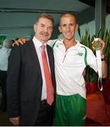 16 August 2013; Men's 50km gold medal winner Robert Heffernan and Professor Ciarán Ó Catháin, President of Athletics Ireland, in Dublin airport on his return from the IAAF World Athletics Championships in Moscow. Dublin Airport, Dublin. Picture credit: Tomás Greally