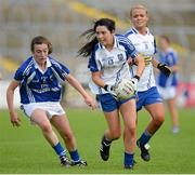 17 August 2013; Cathriona McConnell, Monaghan, in action against Laura Marie Maher, Laois. TG4 All-Ireland Ladies Football Senior Championship, Quarter-Final, Laois v Monaghan, Kingspan Breffni Park, Cavan. Picture credit: Oliver McVeigh / SPORTSFILE