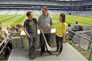 17 August 2013; Alisha Boyle, from Antrim, and Andrew Barry, from Pittsburgh, Pennsylvania, USA, with Clare legend Sean McMahon. Seán McMahon, was the latest to feature on the Bord Gáis Energy Legends Tour Series 2013 when he gave a unique tour of the Croke Park stadium and facilities this week. Other greats of the game still to feature this summer on the Bord Gáis Energy Legends Tour Series include Steven McDonnell and Pat Gilroy. Full details and dates for the Bord Gáis Energy Legends Tour Series 2013 are available on www.crokepark.ie/events. Croke Park, Dublin. Picture credit: Pat Murphy / SPORTSFILE