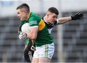 27 November 2022; Michael Quinlivan of Clonmel Commercials in action against Iain Corbett of Newcastle West during the AIB Munster GAA Football Senior Club Championship Semi-Final match between Clonmel Commercials and Newcastle West at FBD Semple Stadium in Thurles, Tipperary. Photo by Michael P Ryan/Sportsfile