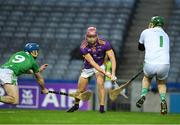 27 November 2022; The St Mullin’s goalkeeper Kevin Kehoe and team mate Paudie Kehoe of St Mullin’s combine to thwart this effort on goal by Brendan Scanlan of Kilmacud Crokes during the AIB Leinster GAA Hurling Senior Club Championship Semi-Final match between Naomh Moling and Kilmacud Crokes at Croke Park in Dublin. Photo by Daire Brennan/Sportsfile