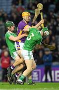 27 November 2022; Ronan Hayes of Kilmacud Crokes is tackled by Paidi O’Shea, left, and Paul Doyle of St Mullin’s during the AIB Leinster GAA Hurling Senior Club Championship Semi-Final match between Naomh Moling and Kilmacud Crokes at Croke Park in Dublin. Photo by Daire Brennan/Sportsfile