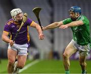 27 November 2022; Fionn Ó Ceallaigh of Kilmacud Crokes is tackled by Paudie Kehoe of St Mullin’s during the AIB Leinster GAA Hurling Senior Club Championship Semi-Final match between Naomh Moling and Kilmacud Crokes at Croke Park in Dublin. Photo by Daire Brennan/Sportsfile