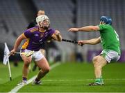 27 November 2022; Fionn Ó Ceallaigh of Kilmacud Crokes is tackled by Paudie Kehoe of St Mullin’s during the AIB Leinster GAA Hurling Senior Club Championship Semi-Final match between Naomh Moling and Kilmacud Crokes at Croke Park in Dublin. Photo by Daire Brennan/Sportsfile