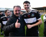 27 November 2022; Emmet Rigter of Newcastle West celebrates with a supporter after his side's victory in the AIB Munster GAA Football Senior Club Championship Semi-Final match between Clonmel Commercials and Newcastle West at FBD Semple Stadium in Thurles, Tipperary. Photo by Michael P Ryan/Sportsfile
