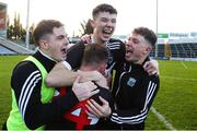 27 November 2022; Emmet Rigter of Newcastle West, centre, celebrates with team-mates after their side's victory in the AIB Munster GAA Football Senior Club Championship Semi-Final match between Clonmel Commercials and Newcastle West at FBD Semple Stadium in Thurles, Tipperary. Photo by Michael P Ryan/Sportsfile