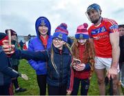 27 November 2022; Conor Cooney, captain of St. Thomas poses for a photo with supporters after the Galway County Senior Hurling Championship Final Replay match between St Thomas and Loughrea at Pearse Stadium in Galway. Photo by Ray Ryan/Sportsfile