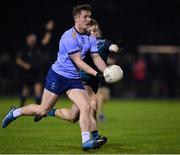 30 November 2022; Jeaic McKelvey of UCD in action against Aaron Brazil of Maynooth University during the Electric Ireland Higher Education Senior Football Division 1 League Final match between UCD and Maynooth University at the Dublin City University Sports Campus in Dublin. Photo by Seb Daly/Sportsfile