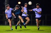 30 November 2022; Dermot Hanafin of Maynooth University in action against James Moran, left, and Patrick O'Keane of UCD during the Electric Ireland Higher Education Senior Football Division 1 League Final match between UCD and Maynooth University at the Dublin City University Sports Campus in Dublin. Photo by Tyler Miller/Sportsfile