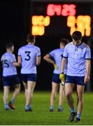 30 November 2022; Liam Smith of UCD leaves the pitch after his side's defeat in the Electric Ireland Higher Education Senior Football Division 1 League Final match between UCD and Maynooth University at the Dublin City University Sports Campus in Dublin. Photo by Seb Daly/Sportsfile