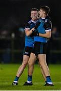 30 November 2022; John Lawlor of Maynooth University, left, celebrates with teammate Darragh Warnock after their side's victory in the Electric Ireland Higher Education Senior Football Division 1 League Final match between UCD and Maynooth University at the Dublin City University Sports Campus in Dublin. Photo by Seb Daly/Sportsfile