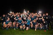 30 November 2022; Maynooth University players celebrate with the Ryan Cup after their side's victory in the Electric Ireland Higher Education Senior Football Division 1 League Final match between UCD and Maynooth University at the Dublin City University Sports Campus in Dublin. Photo by Seb Daly/Sportsfile